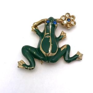 vintage green frog brooch with rhinestone flower and eyes (1960s?)